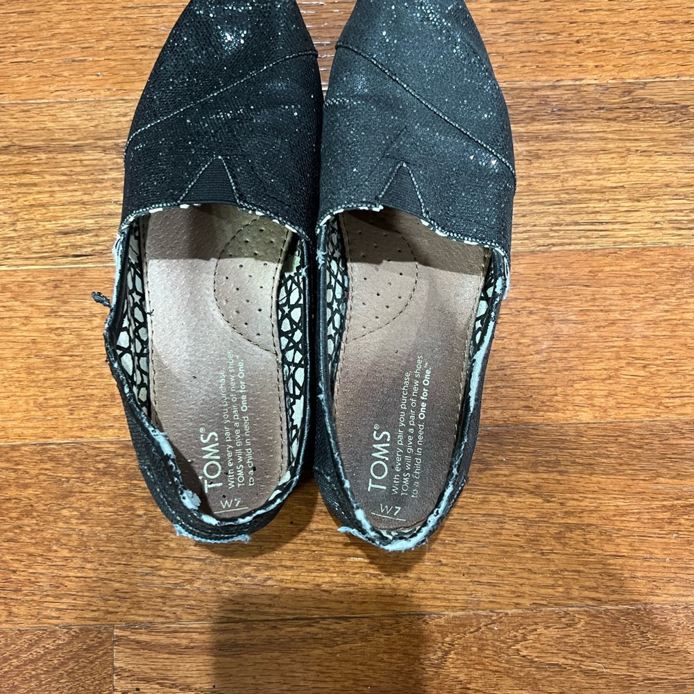 TOMs black glitter shoe size 7.